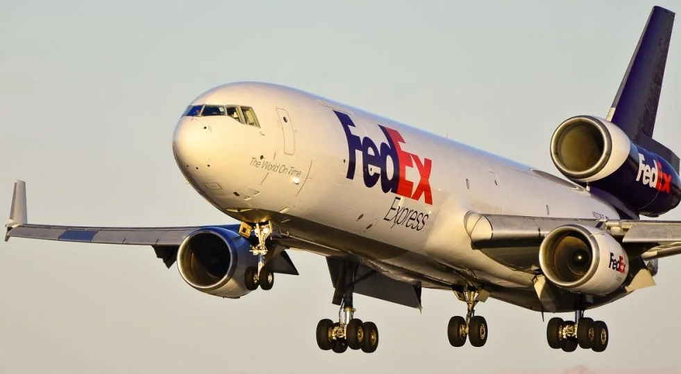 This FedEx MD-11 also has a middle landing gear.